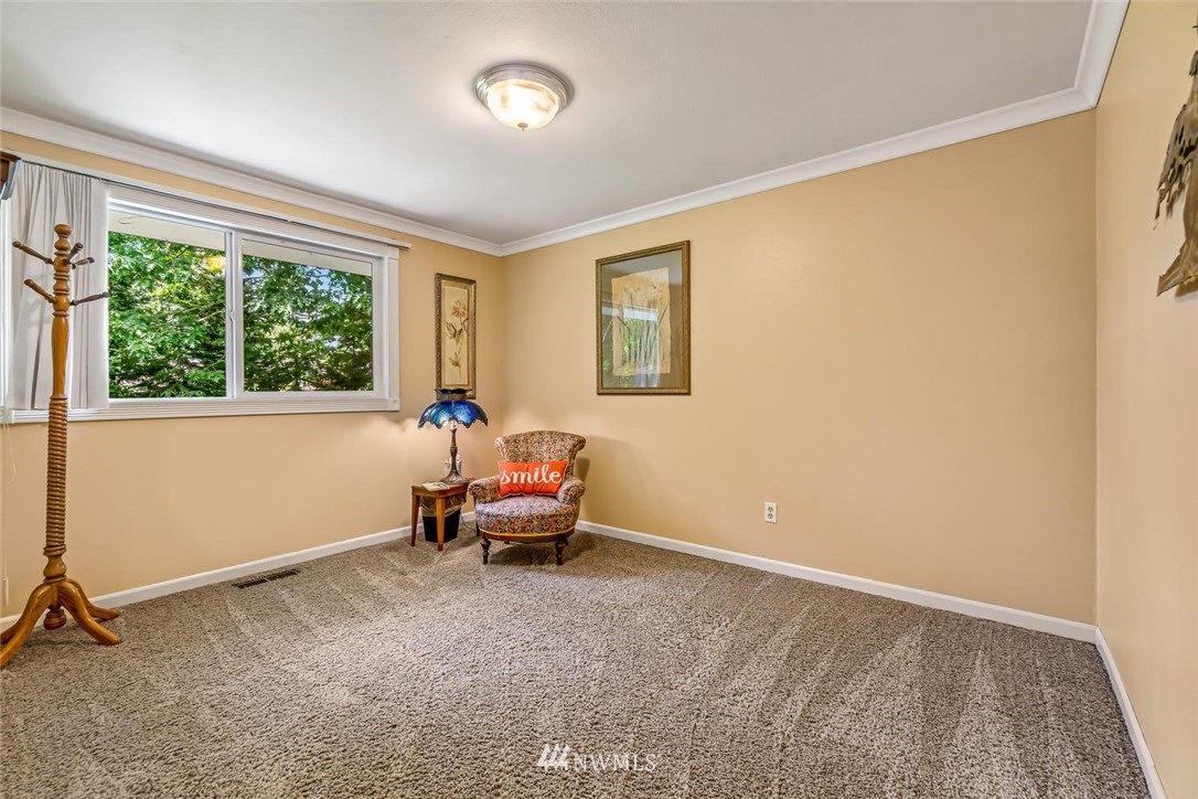 11812 Northeast 157th Street Bothell, WA 98011 - Photo 18 of 25 a living room with furniture and a window