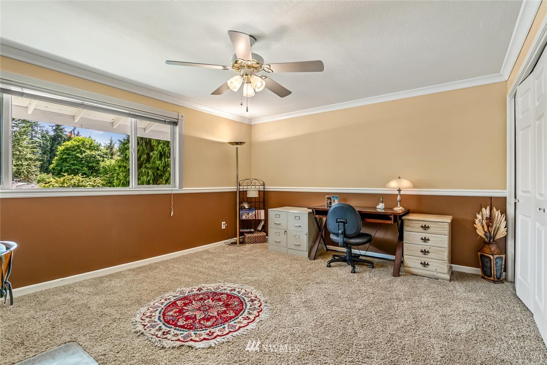 11812 Northeast 157th Street Bothell, WA 98011 - Photo 20 of 25 a view of a workspace with furniture and a window