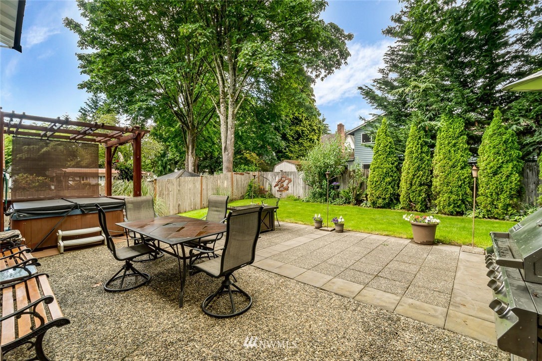 11812 Northeast 157th Street Bothell, WA 98011 - Photo 21 of 25 a view of a backyard with sitting area