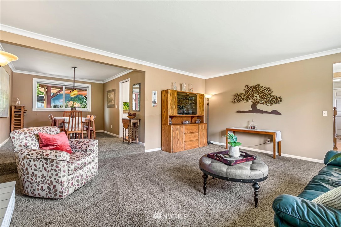 11812 Northeast 157th Street Bothell, WA 98011 - Photo 5 of 25 a living room with furniture and a table