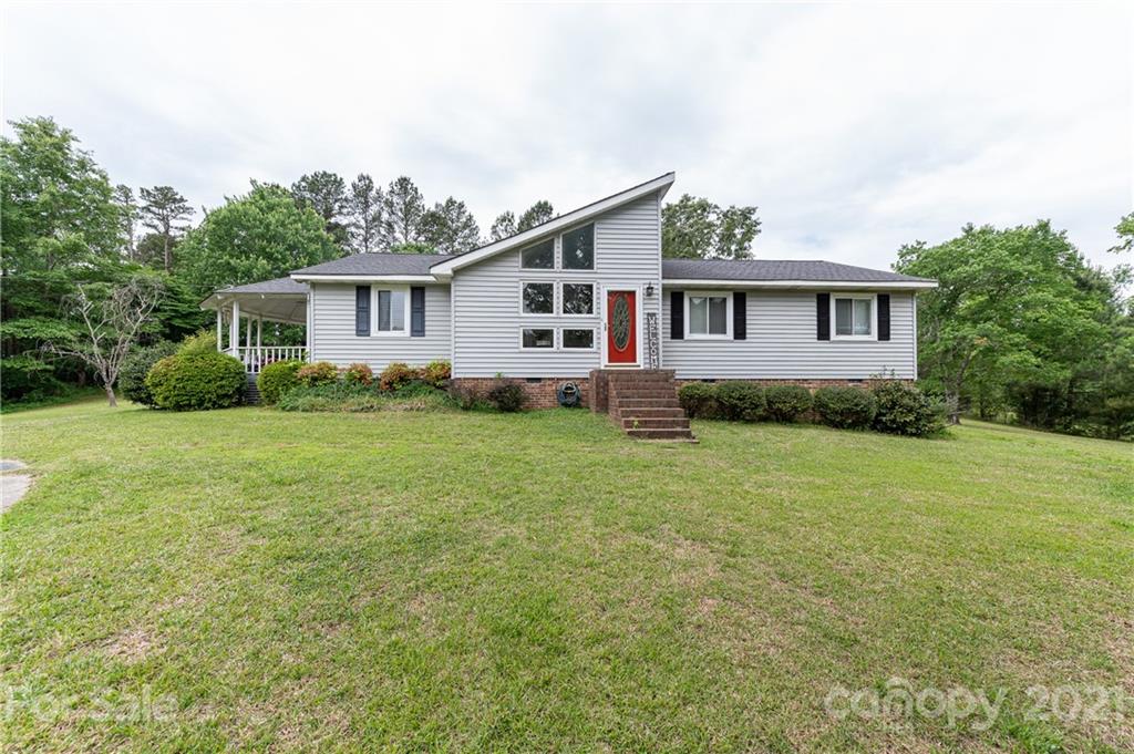 2026 State Rd S-29-726 Lancaster, SC 29720 - Photo 3 of 29 a view of a house with backyard and garden