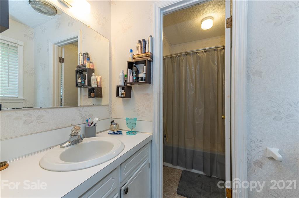 2026 State Rd S-29-726 Lancaster, SC 29720 - Photo 23 of 29 a bathroom with a sink and a mirror