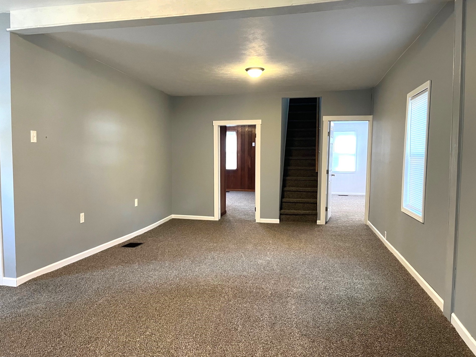 130 South Main Street Springboro, PA 16435 - Photo 10 of 29 Living room features new walls, paint, flooring.