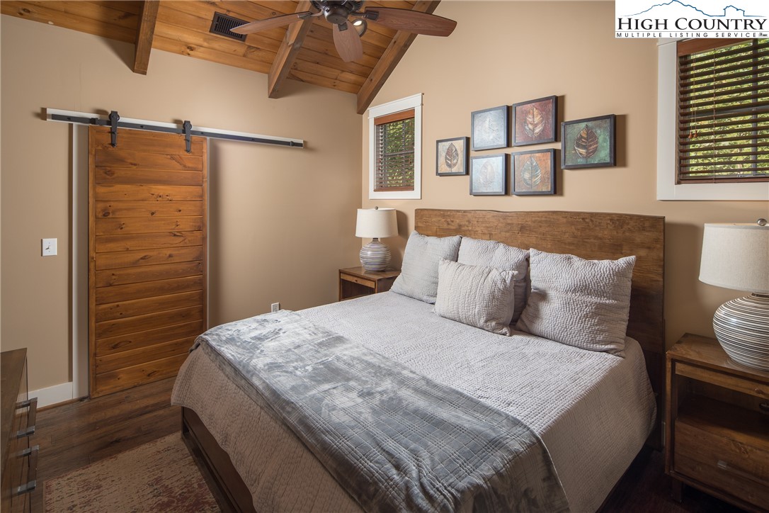 1253 Goldenrod Road Boone, NC 28607 - Photo 14 of 48 a bedroom with a bed and a window