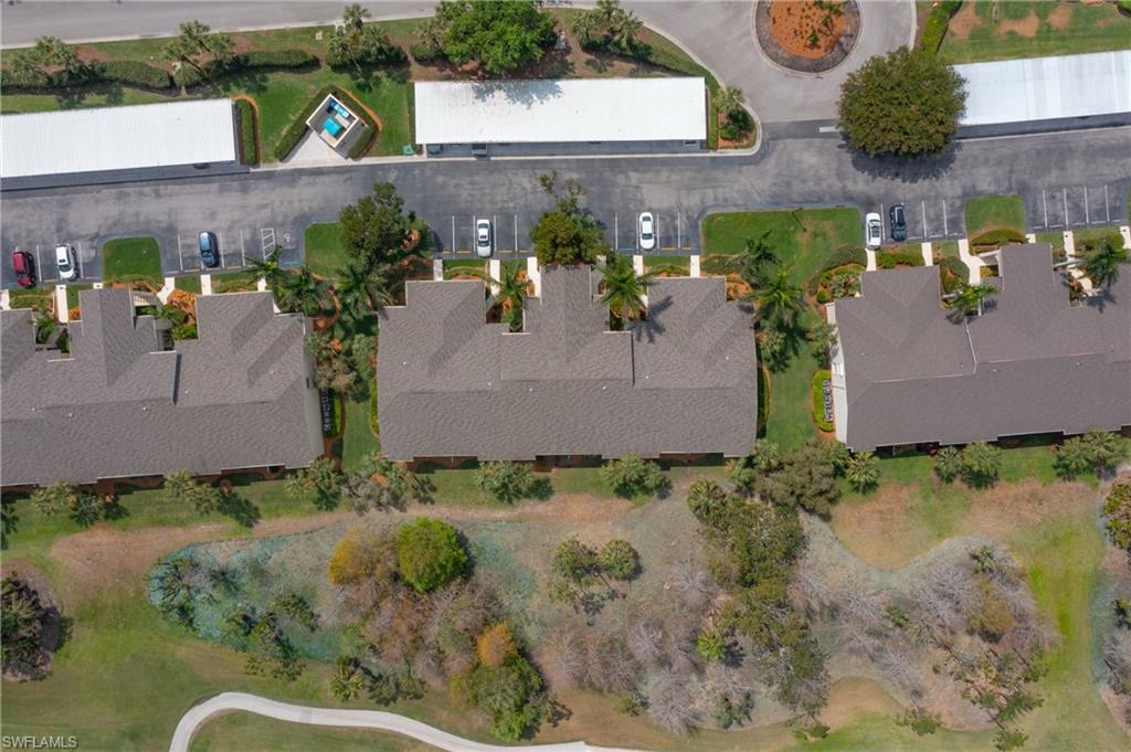 21341 Lancaster Run, Unit 425 Estero, FL 33928 - Photo 22 of 25 an aerial view of a house with a yard