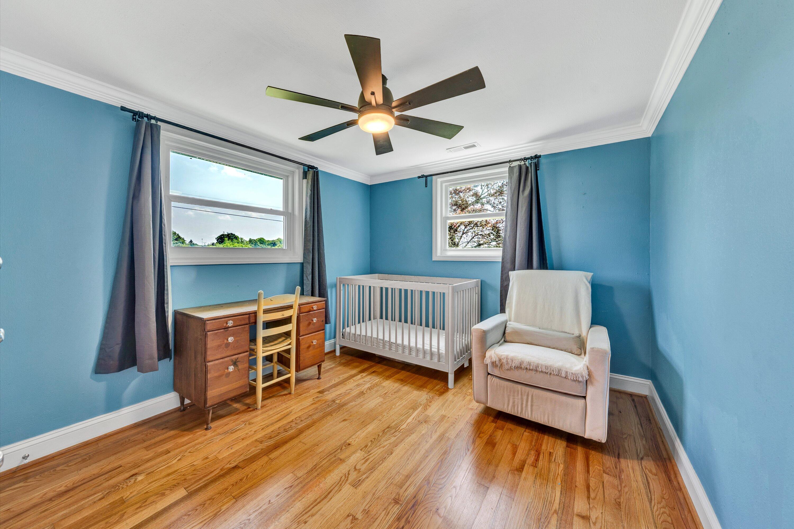 1200 Rock Spring Road Goodview, VA 24095 - Photo 14 of 31 a living room with furniture and a wooden floor