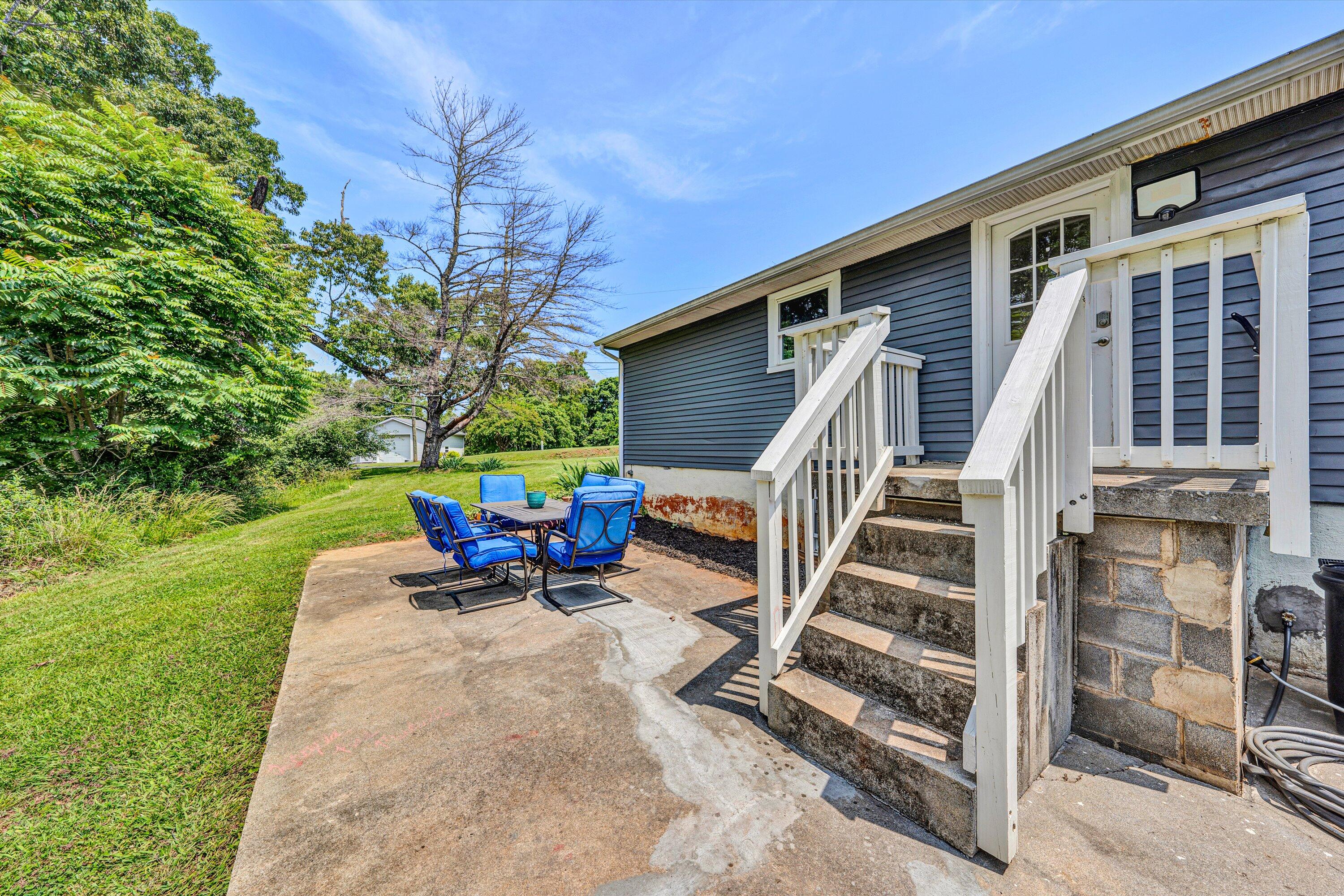 1200 Rock Spring Road Goodview, VA 24095 - Photo 26 of 31 a view of a house with backyard and sitting area