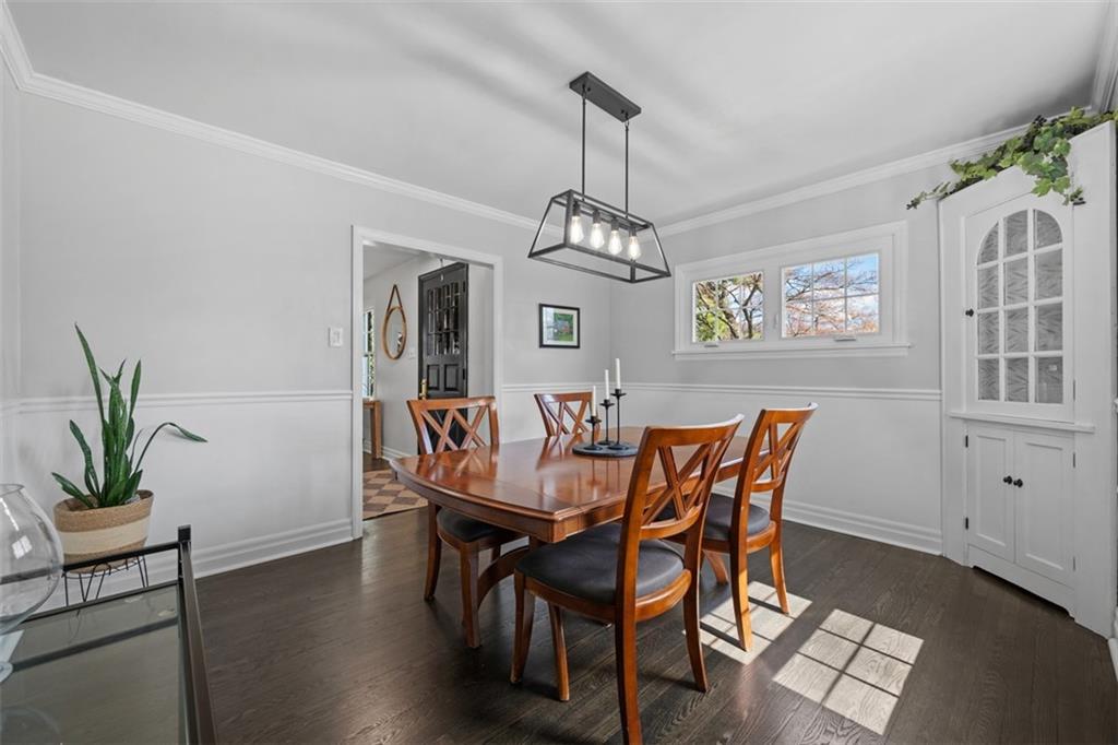106 Sycamore Drive Pittsburgh, PA 15237 - Photo 12 of 41 a dining room with furniture potted plants and wooden floor