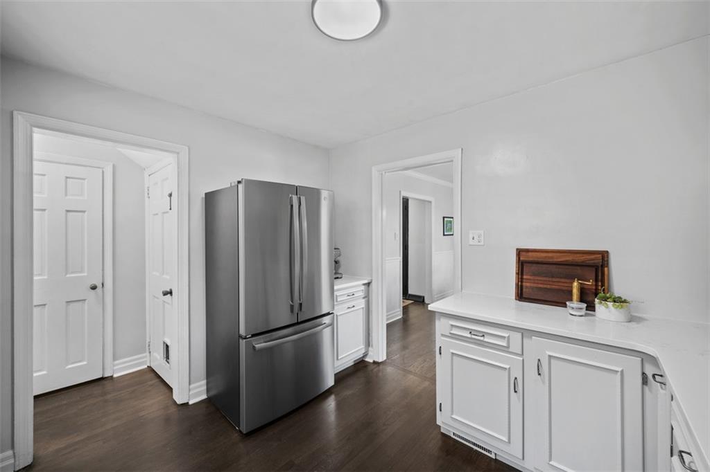 106 Sycamore Drive Pittsburgh, PA 15237 - Photo 18 of 41 a kitchen with stainless steel appliances a refrigerator a stove a sink and white cabinets