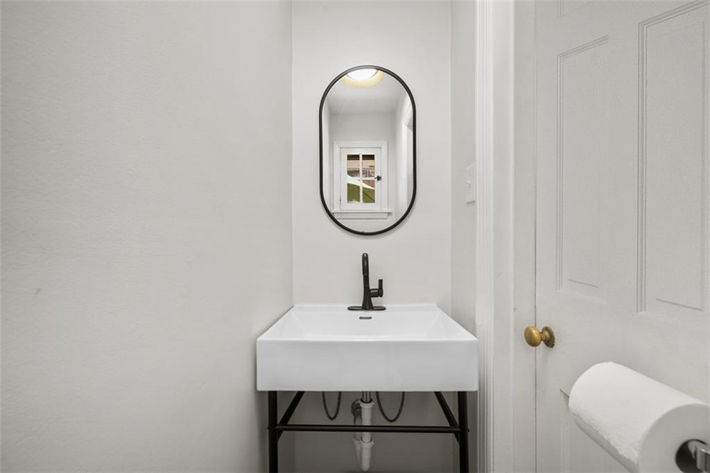 106 Sycamore Drive Pittsburgh, PA 15237 - Photo 19 of 41 a bathroom with a sink and a mirror