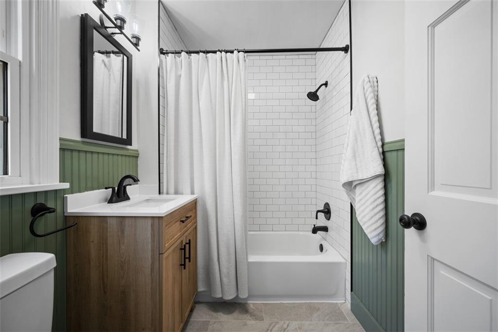 106 Sycamore Drive Pittsburgh, PA 15237 - Photo 26 of 41 a bathroom with a sink a toilet and shower