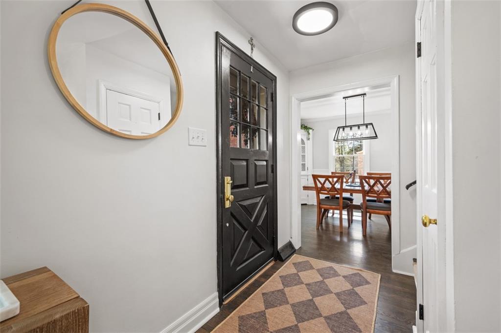 106 Sycamore Drive Pittsburgh, PA 15237 - Photo 3 of 41 wooden floor in a hall with a mirror and a sink