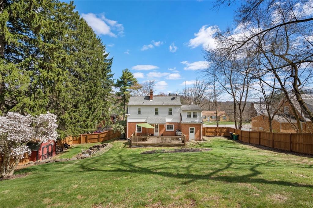 106 Sycamore Drive Pittsburgh, PA 15237 - Photo 32 of 41 a view of a house with a backyard porch and sitting area