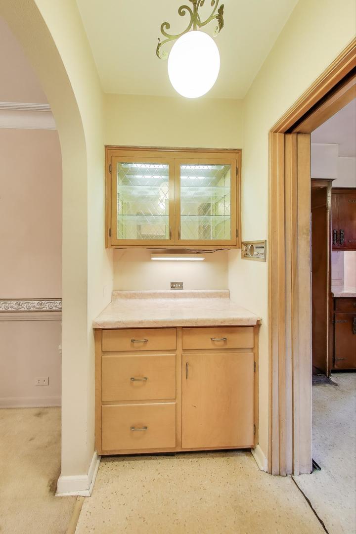 601 Selborne Road Riverside, IL 60546 - Photo 9 of 56 a view of a kitchen with a sink