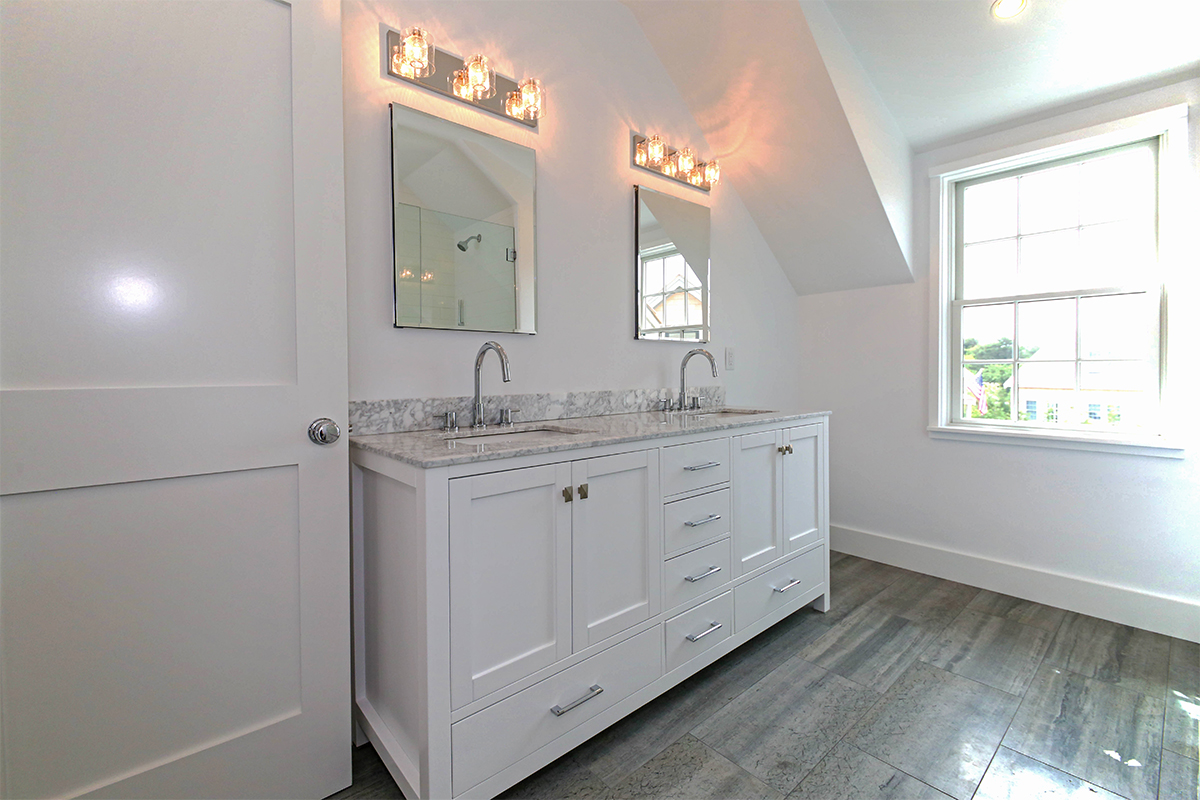 3 Blazing Star Road Nantucket, MA 02554 - Photo 14 of 38 a bathroom with a double vanity sink and a mirror
