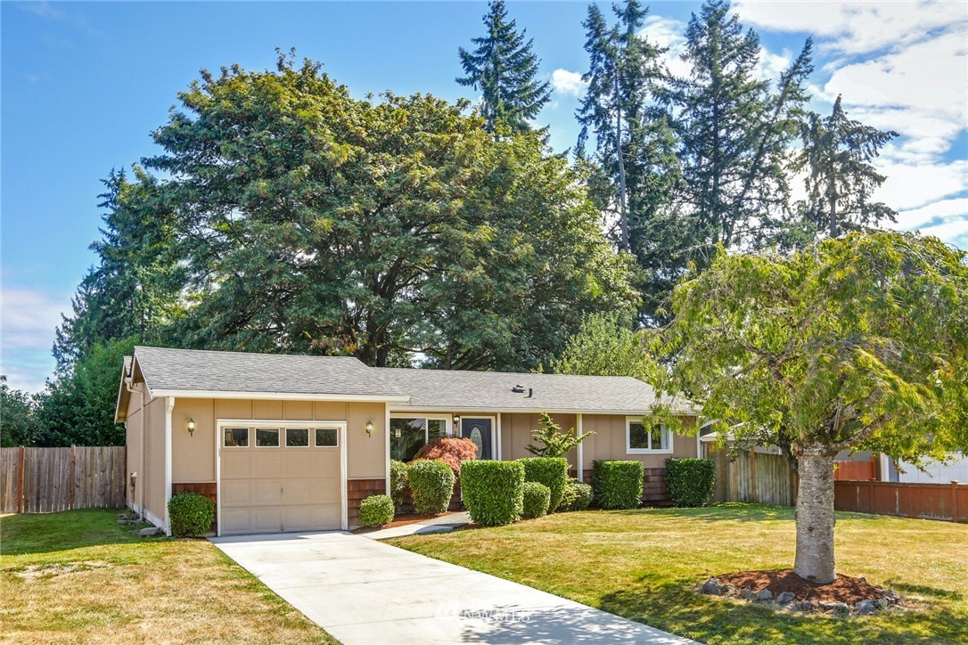 22703 2nd Place West Bothell, WA 98021 - Photo 1 of 23 front view of a house with a yard