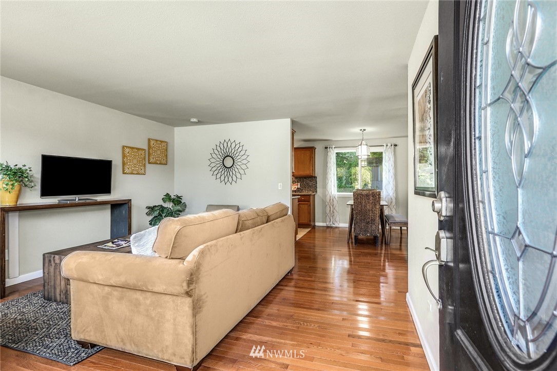 22703 2nd Place West Bothell, WA 98021 - Photo 5 of 23 a living room with furniture and a flat screen tv
