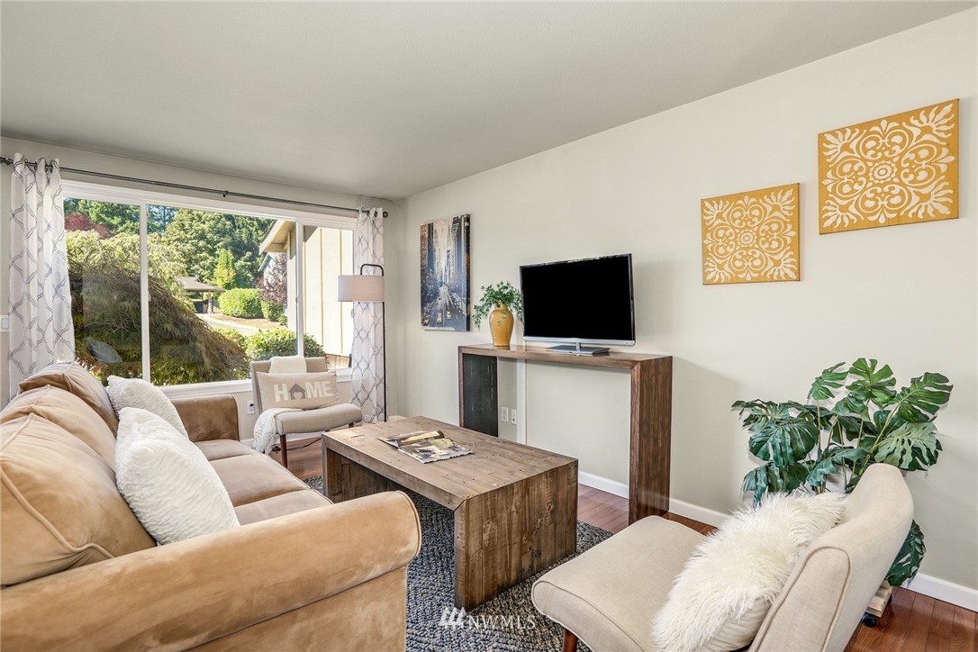 22703 2nd Place West Bothell, WA 98021 - Photo 7 of 23 a living room with furniture and a flat screen tv