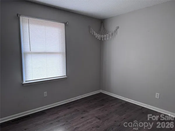 a view of a room that has a window in it