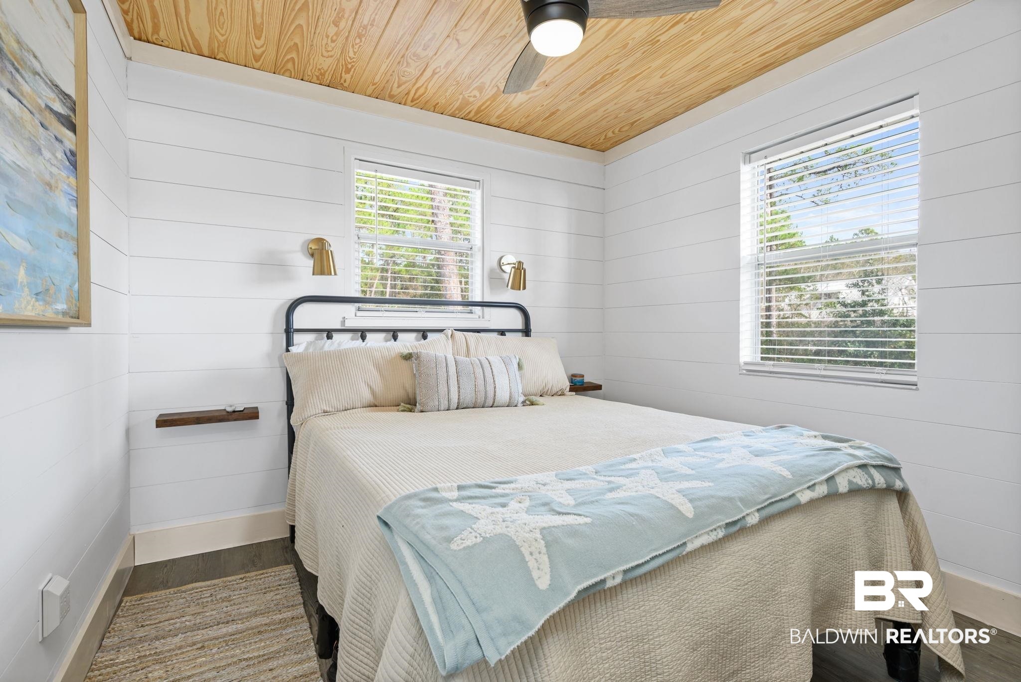 7947 Bayshore Drive Elberta, AL 36530 - Photo 24 of 26 Bedroom featuring wood ceiling, a ceiling fan, wood walls, and wood finished floors