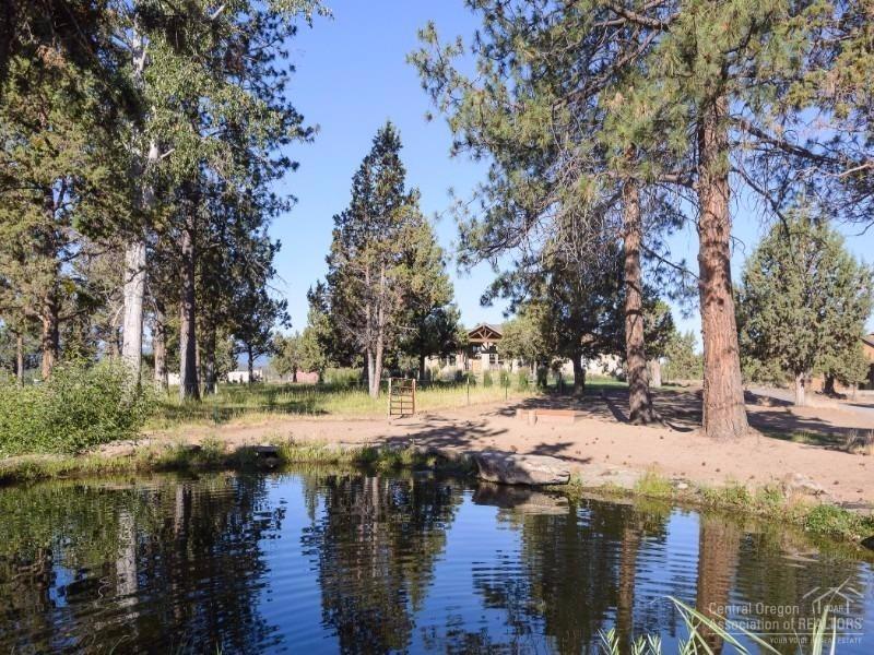 65325 Tweed Road Bend, OR 97703 - Photo 2 of 25 The irrigation pond is as pretty to look