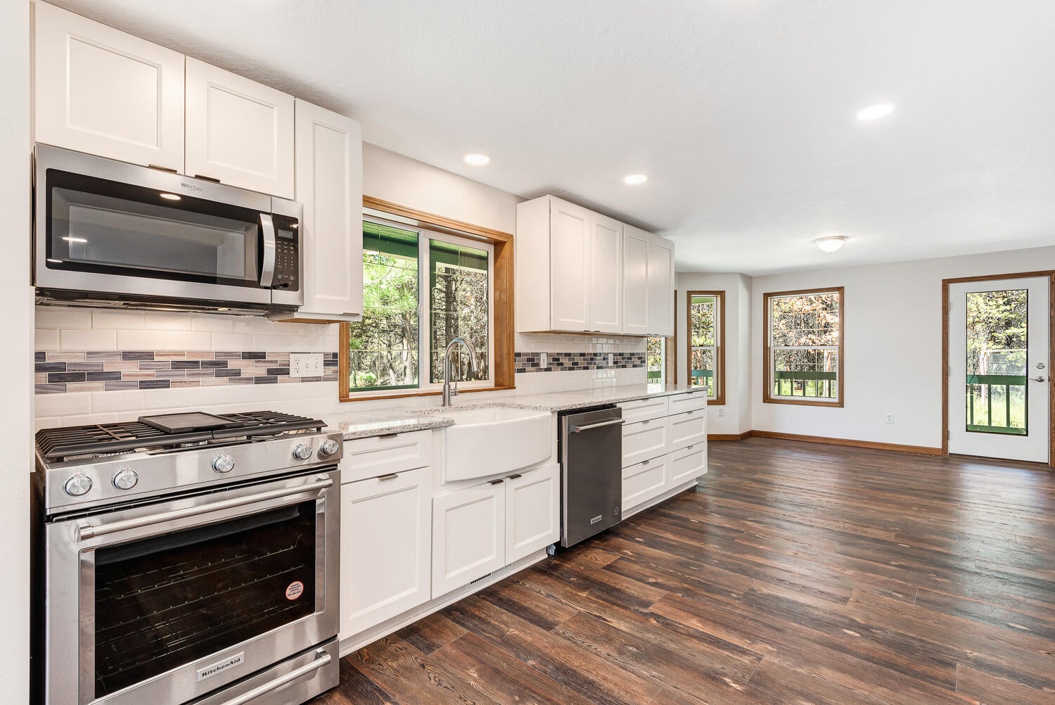 1026 Yoke Road La Pine, OR 97739 - Photo 12 of 42 Kitchen with Farm Sink, Range, and Microwave Above