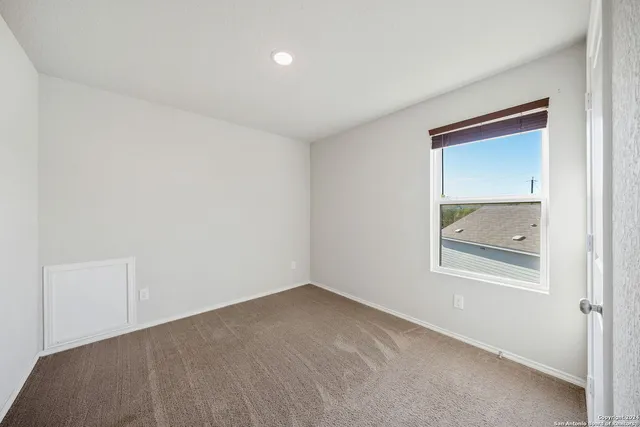 an empty room with a window