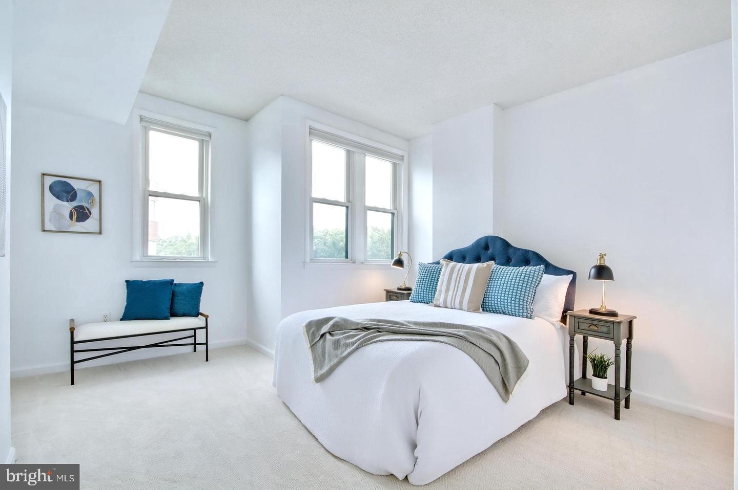 930 Astern Way, Unit 511 Annapolis, MD 21401 - Photo 11 of 27 a spacious bedroom with a bed and a couch