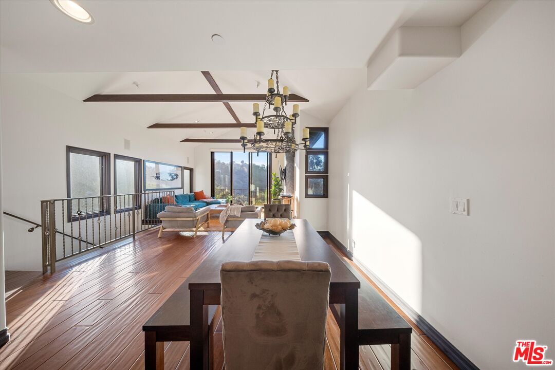 7223 Sycamore Trail Los Angeles, CA 90068 - Photo 11 of 62 a view of a dining room with furniture window and wooden floor