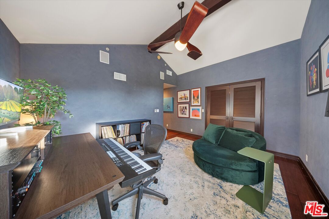 7223 Sycamore Trail Los Angeles, CA 90068 - Photo 26 of 62 a living room with furniture and a potted plant
