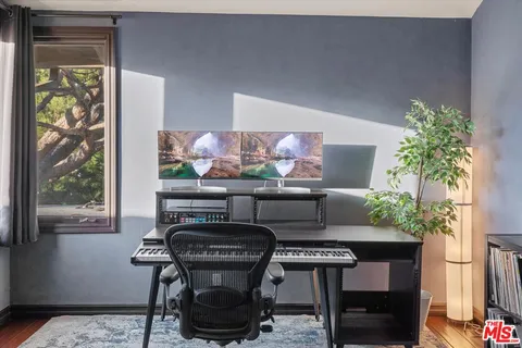 a living room with a couch and a stove