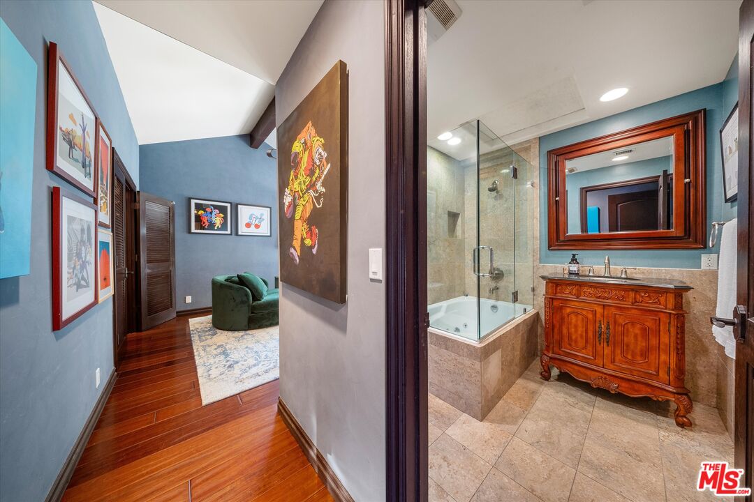 7223 Sycamore Trail Los Angeles, CA 90068 - Photo 28 of 62 a living room with a couch and a stove