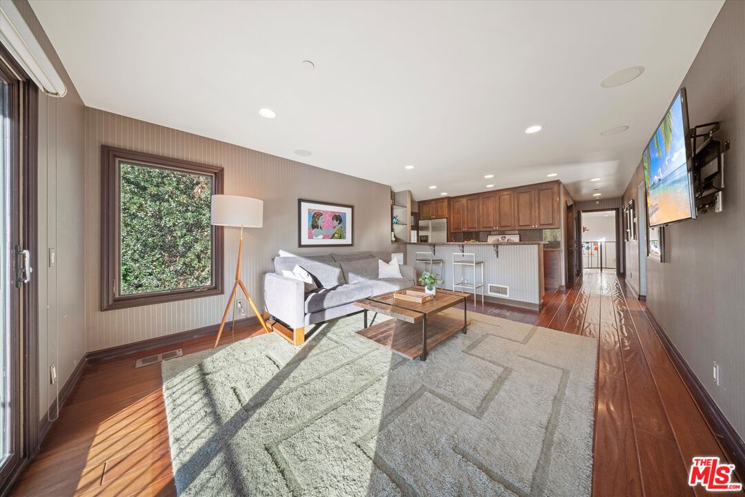 7223 Sycamore Trail Los Angeles, CA 90068 - Photo 31 of 62 a living room with furniture and a table
