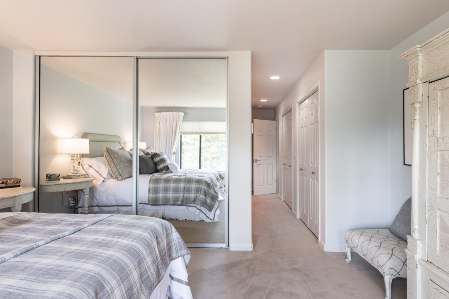 38 Shepherds Knoll Road Monterey, CA 93940 - Photo 14 of 22 a bedroom with bed and a mirror