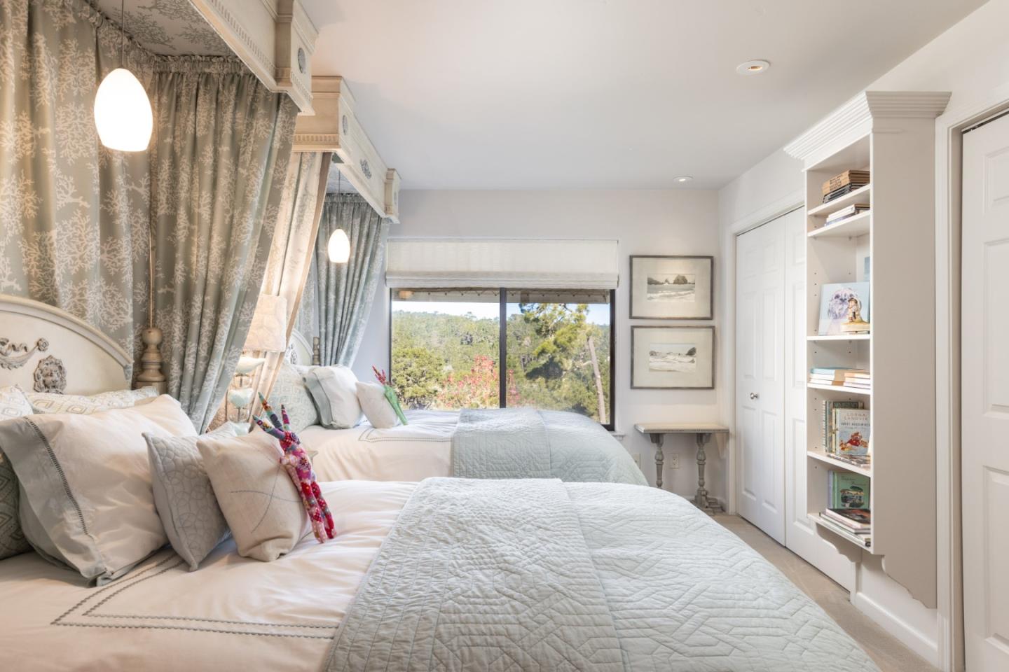 38 Shepherds Knoll Road Monterey, CA 93940 - Photo 20 of 22 a bedroom with a large bed and a window