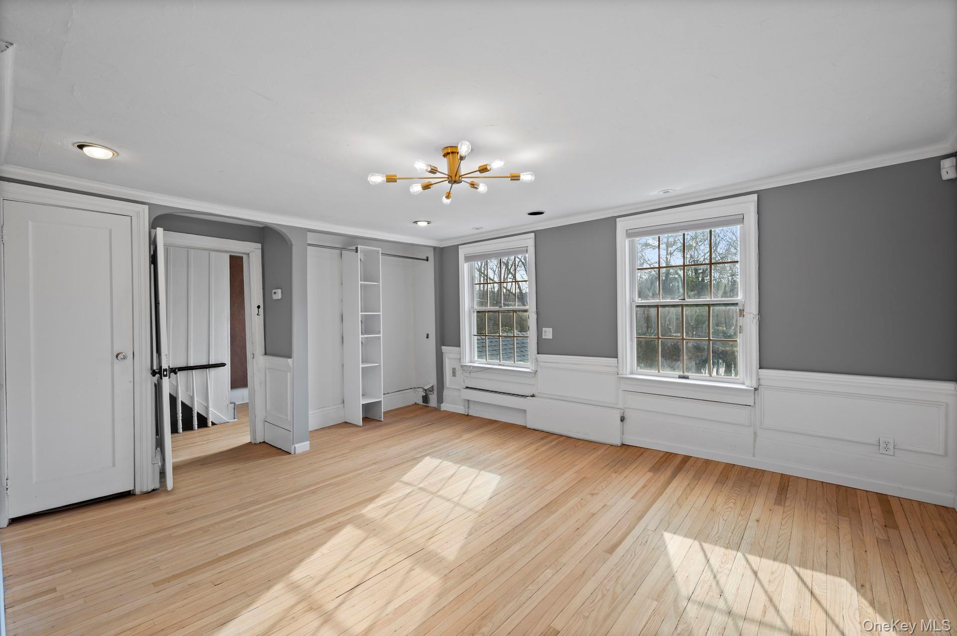 82 Shingle House Road Millwood, NY 10546 - Photo 17 of 50 a view of an empty room with a window and wooden floor