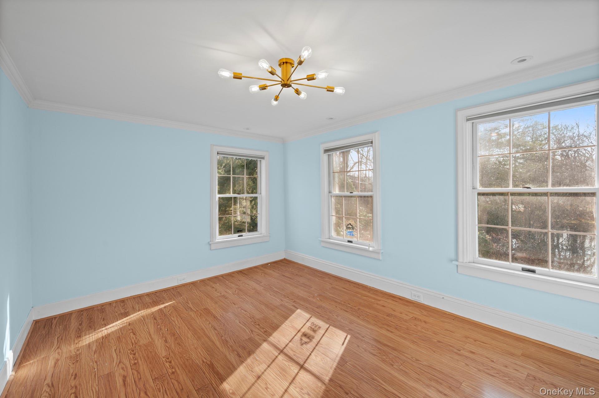 82 Shingle House Road Millwood, NY 10546 - Photo 22 of 50 a view of an empty room with wooden floor and a window