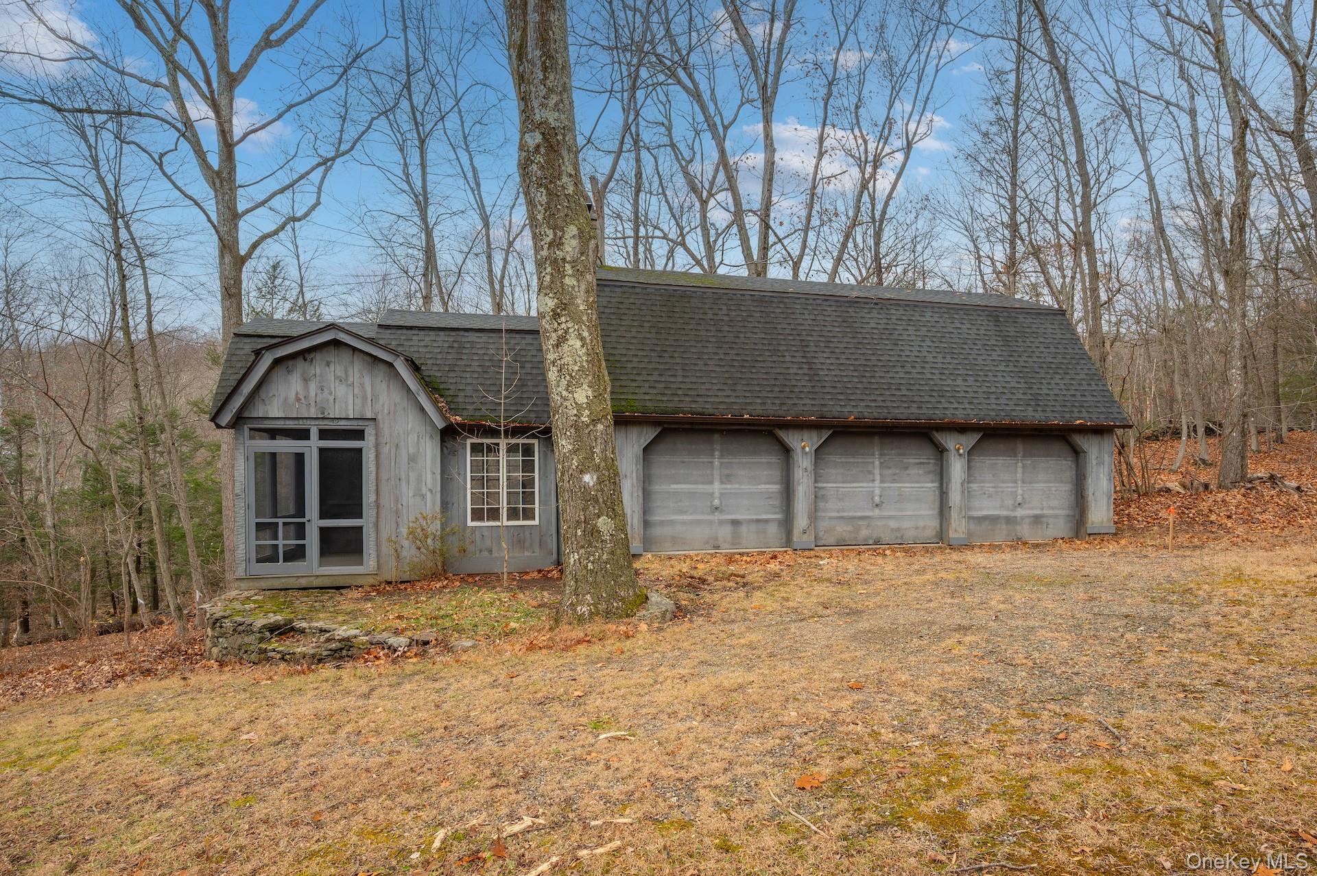 82 Shingle House Road Millwood, NY 10546 - Photo 40 of 50 front view of a house with a yard