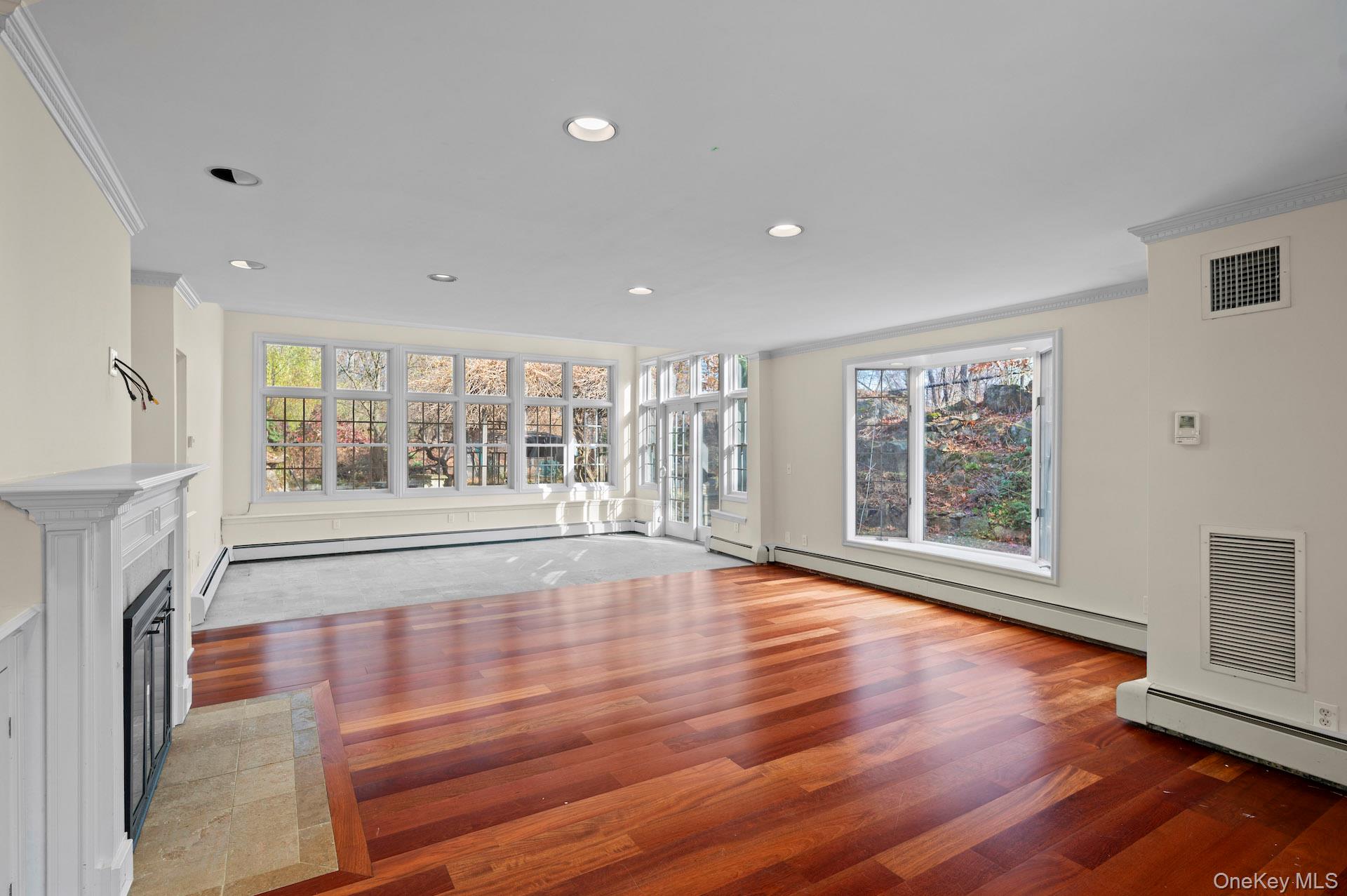 82 Shingle House Road Millwood, NY 10546 - Photo 7 of 50 a view of an empty room with wooden floor and a window