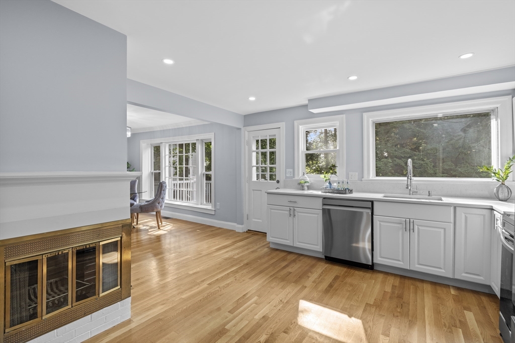 108 Radcliffe Road Belmont, MA 02478 - Photo 15 of 31 a kitchen with stainless steel appliances granite countertop a stove a sink and a refrigerator