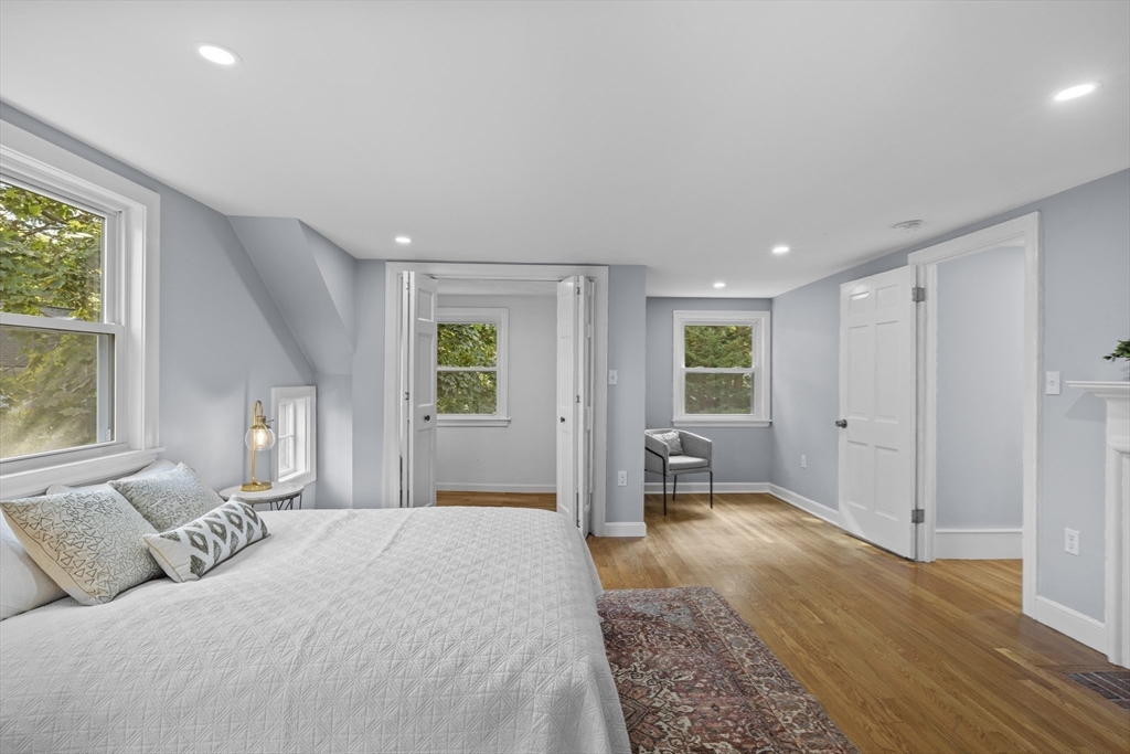 108 Radcliffe Road Belmont, MA 02478 - Photo 22 of 31 a spacious bedroom with a large bed and a window