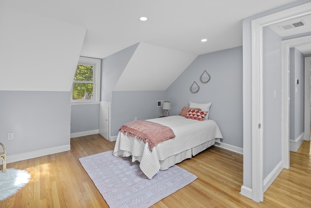 108 Radcliffe Road Belmont, MA 02478 - Photo 24 of 31 a bedroom with a bed and window