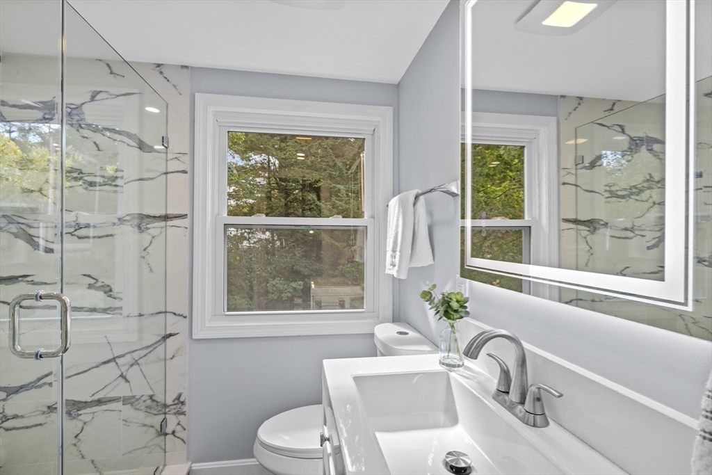 108 Radcliffe Road Belmont, MA 02478 - Photo 26 of 31 a bathroom with a sink toilet and shower