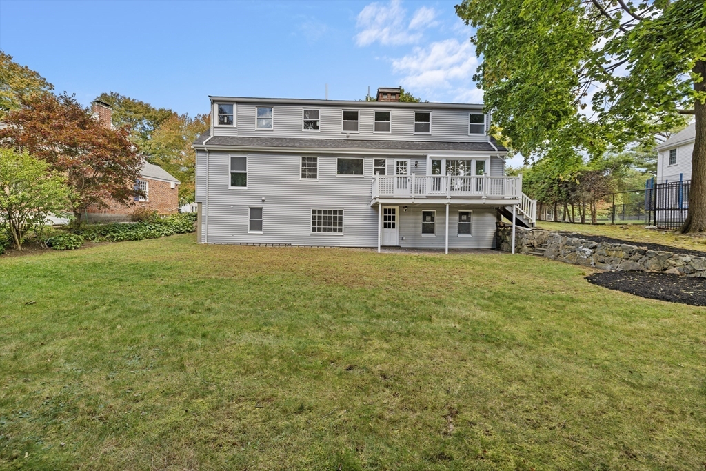 108 Radcliffe Road Belmont, MA 02478 - Photo 3 of 31 a front view of a house with a yard