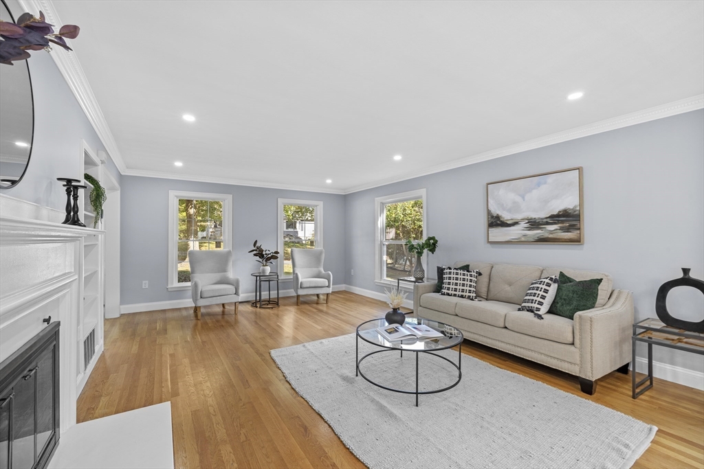 108 Radcliffe Road Belmont, MA 02478 - Photo 9 of 31 a living room with furniture and a wooden floor