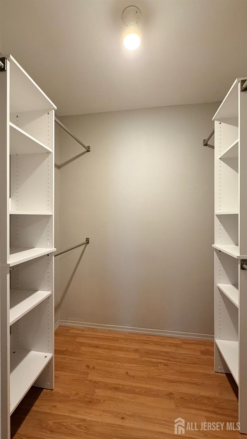 363 Cranbury Road, Unit D16 East Brunswick, NJ 08816 - Photo 17 of 32 a view of an empty walk in closet
