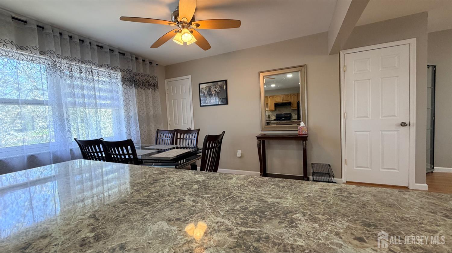 363 Cranbury Road, Unit D16 East Brunswick, NJ 08816 - Photo 28 of 32 a living room with furniture and a window