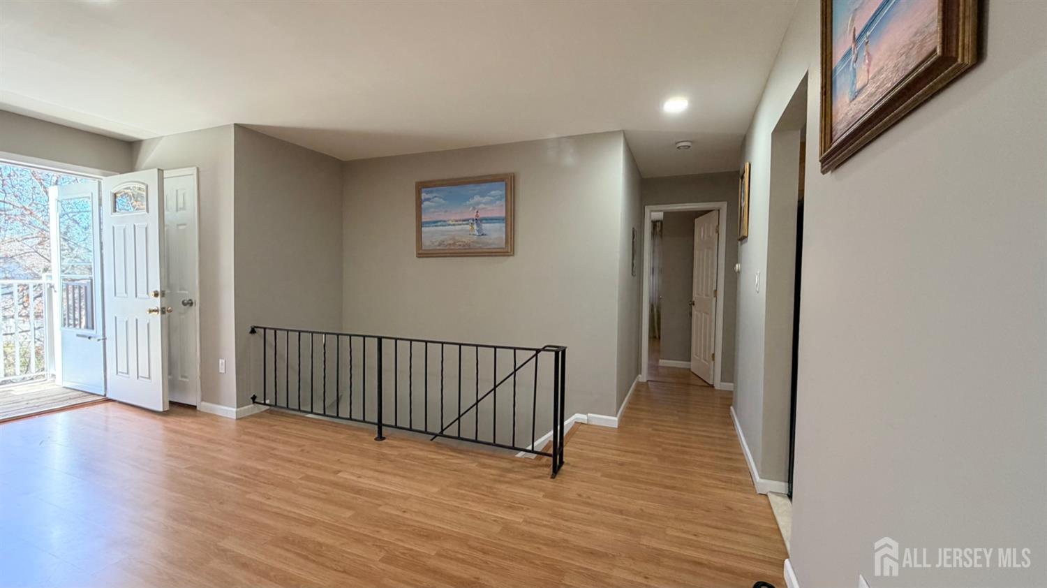 363 Cranbury Road, Unit D16 East Brunswick, NJ 08816 - Photo 6 of 32 a view of hallway with wooden floor