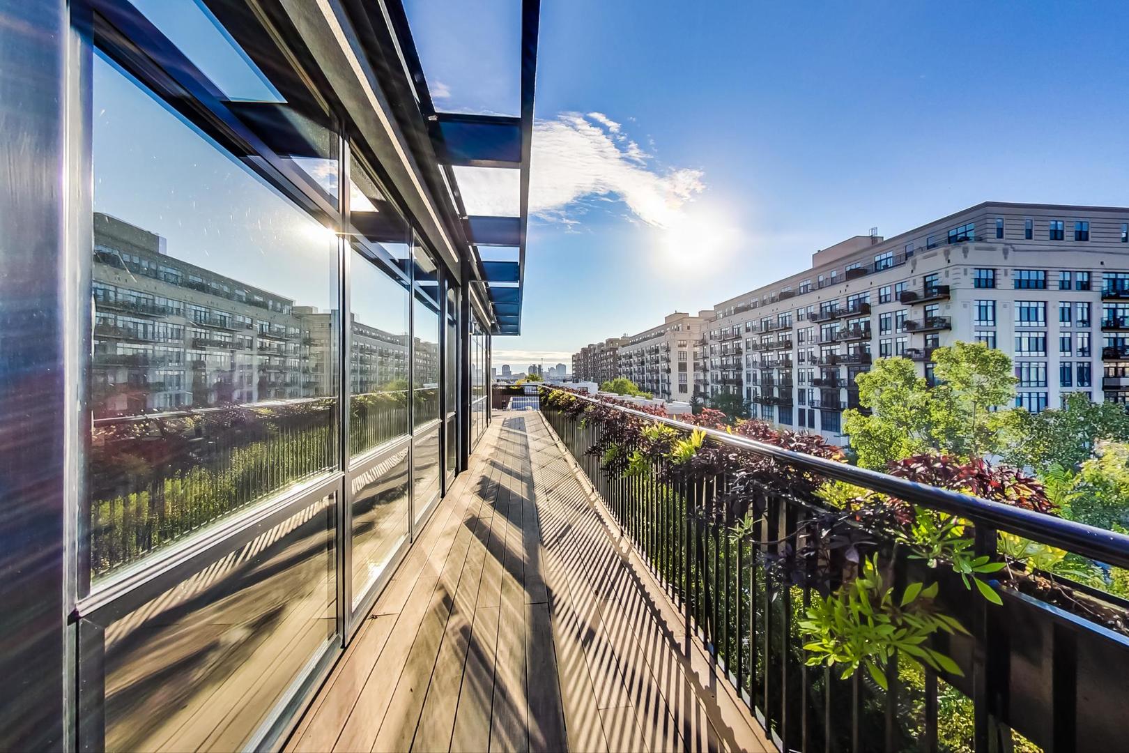 1001 West 15th Street, Unit 241 Chicago, IL 60608 - Photo 26 of 41 a view of balcony with wooden floor