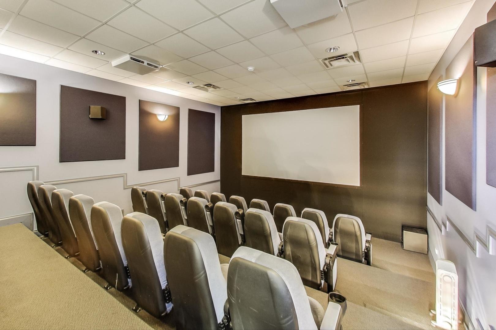 1001 West 15th Street, Unit 241 Chicago, IL 60608 - Photo 35 of 41 a projector room with furniture